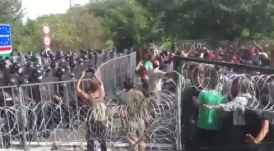 Węgry: trwają starcia imigrantów z policją. Kamienie vs gaz i armatki wodne (video)